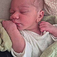 Mahé participe au concours pour gagner de l'argent avec cette photo : newborn, baby, sleeping, blanket, infant, face, skin, hand, cozy, soft, closeup, peaceful, resting, cute, child, portrait, indoors, wrapped, delicate, young