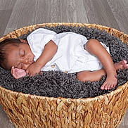 Nathaniel joined the competition — help win amazing prizes! baby, basket, bed, blanket, cradle, crib, face, furniture, hardwood, head, infantbed, newborn, person, sleeping, wood, woven