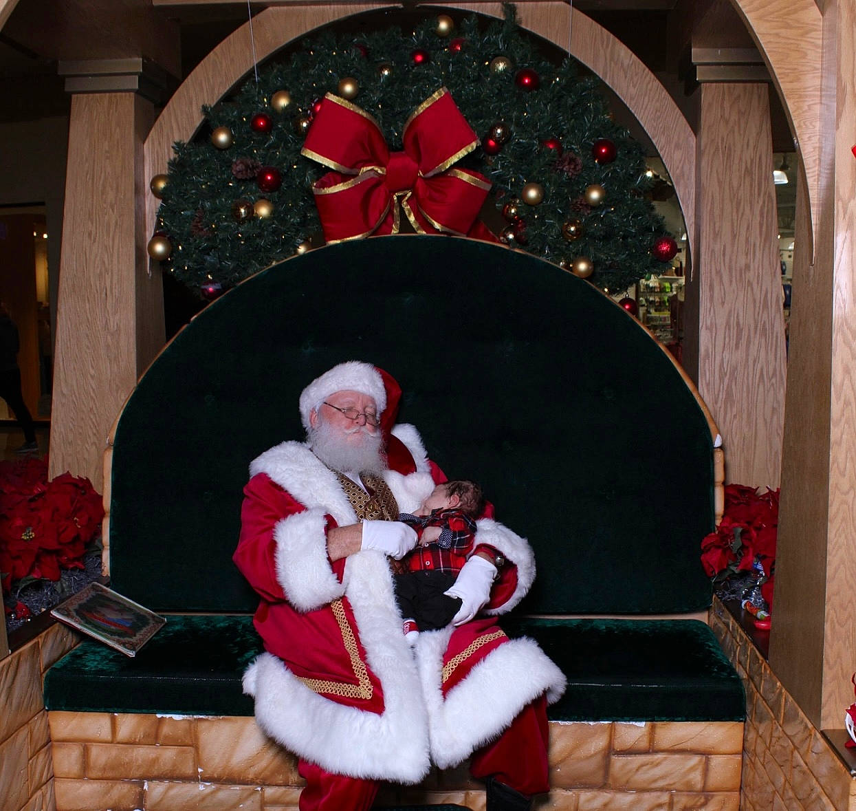 Zandar is registered to the contest to win money with this photo: carmine, christmas, christmas_decoration, christmas_eve, christmas_ornament, event, fictional_character, fun, holiday, holiday_ornament, interior_design, lap, ornament, person, red, santa_claus, tradition, white, window, winter