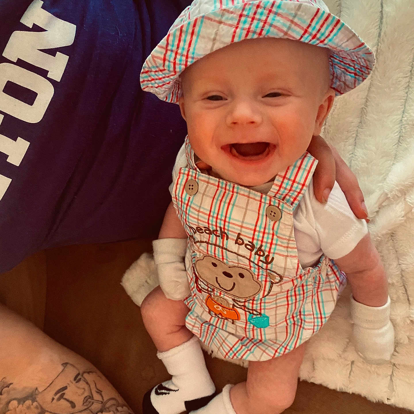 Jaggur joined the competition — help win amazing prizes! accessories, baby, babylaughing, baseballcap, cap, clothing, face, happy, hat, head, hosiery, jewelry, laughing, person, photography, portrait, shorts, skin, sock, tattoo