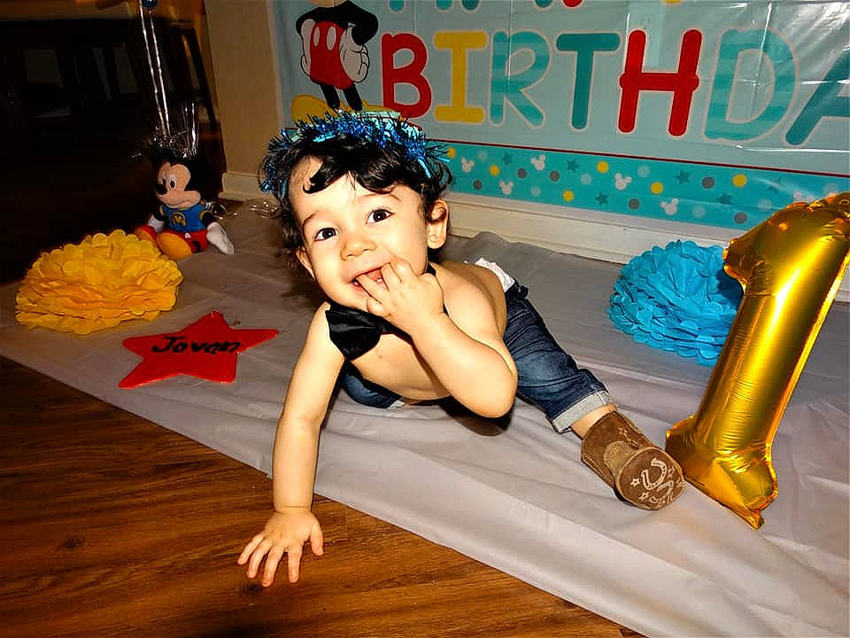 Jovan is registered to the contest to win money with this photo: beauty, black_hair, entertainment, finger, flooring, fun, games, happy, hardwood, human_leg, leg, leisure, person, recreation, room, sitting, smile, sportswear, thigh, toy