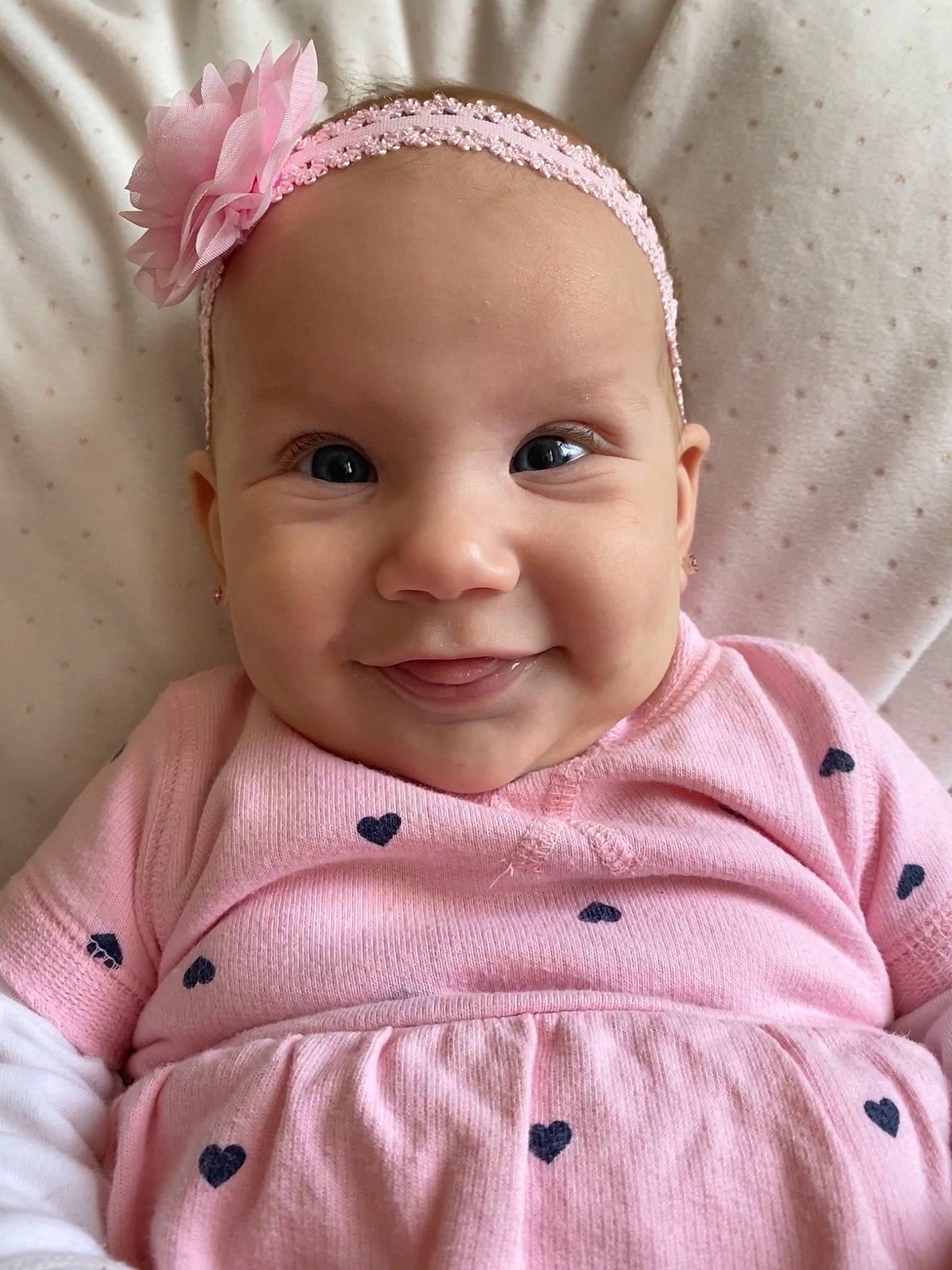 Aisha joined the competition — help win amazing prizes! baby, baby_toddler_clothing, cheek, chin, clothing, dress, eye, eyebrow, eyelash, face, facial_expression, happy, iris, joy, lip, nose, person, pink, skin, sleeve