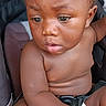 Davell joined the competition — help win amazing prizes! baby, child, car_seat, infant, skin, expression, hand, seatbelt, portrait, curious, indoors, closeup, young, person, cute, sitting, looking_down, human, face, baby_skin