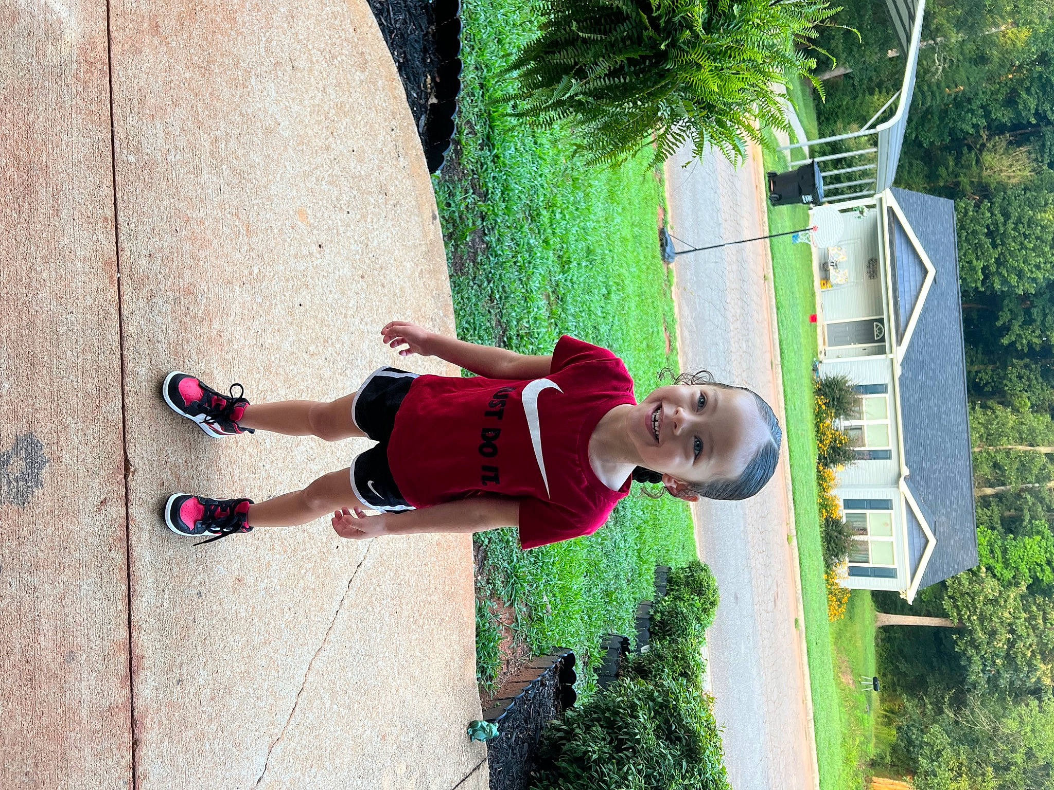 Aryanna joined the competition — help win amazing prizes! carmine, child, fun, grass, hat, house, human_body, human_leg, joy, knee, leisure, magenta, people_in_nature, person, plant, recreation, shorts, t_shirt, thigh, toddler