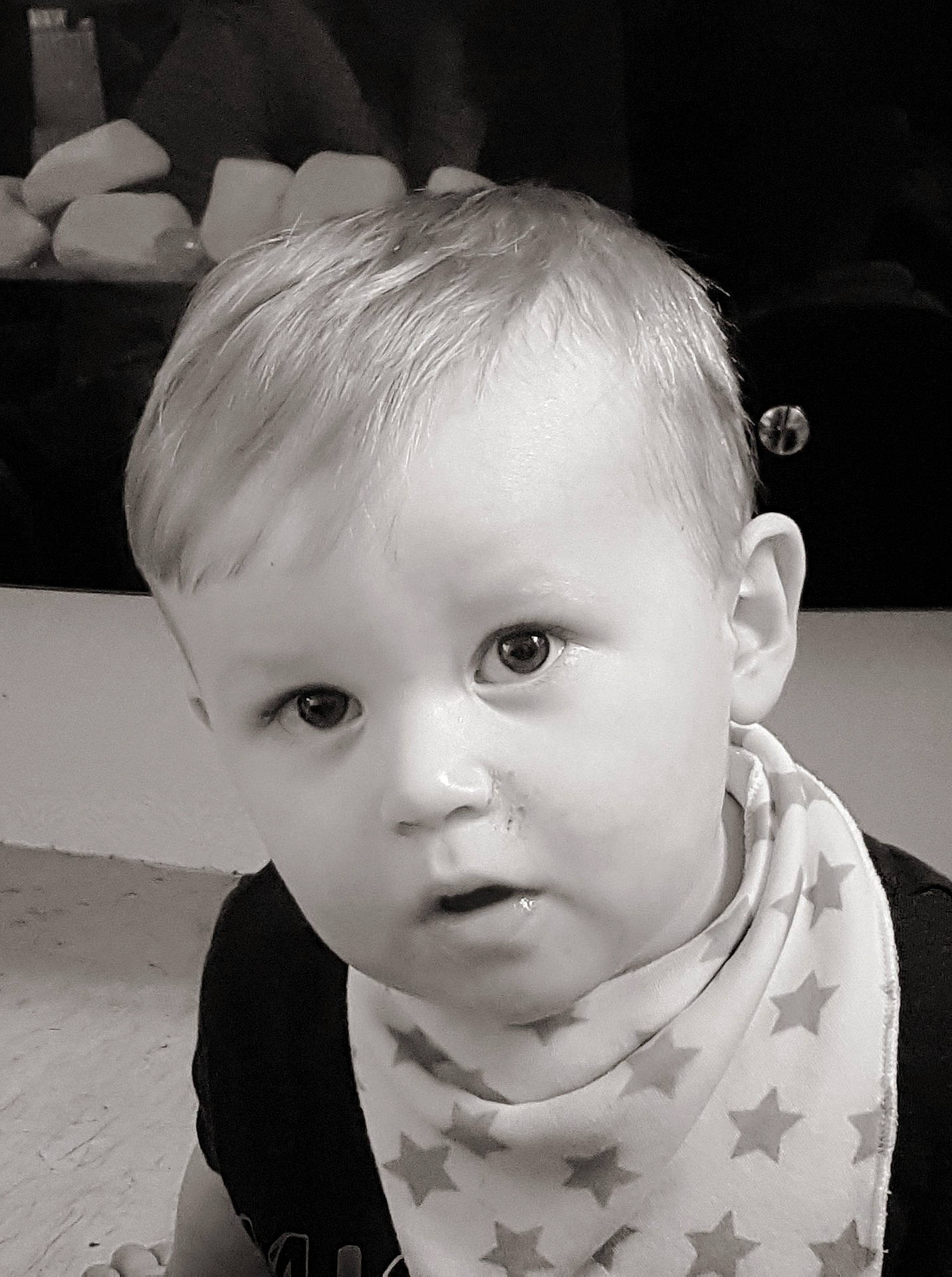 Hayden Hall is registered to the contest to win money with this photo: black, black_and_white, boy, cheek, child, eye, face, facial_expression, hair, head, human_hair_color, infant, monochrome_photography, nose, person, photograph, photography, skin, smile, white