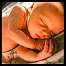 newborn, baby, sleeping, infant, peaceful, skin, face, hand, fingers, blanket, floral, resting, closeup, portrait, soft_light, delicate, cute, young, child, serene