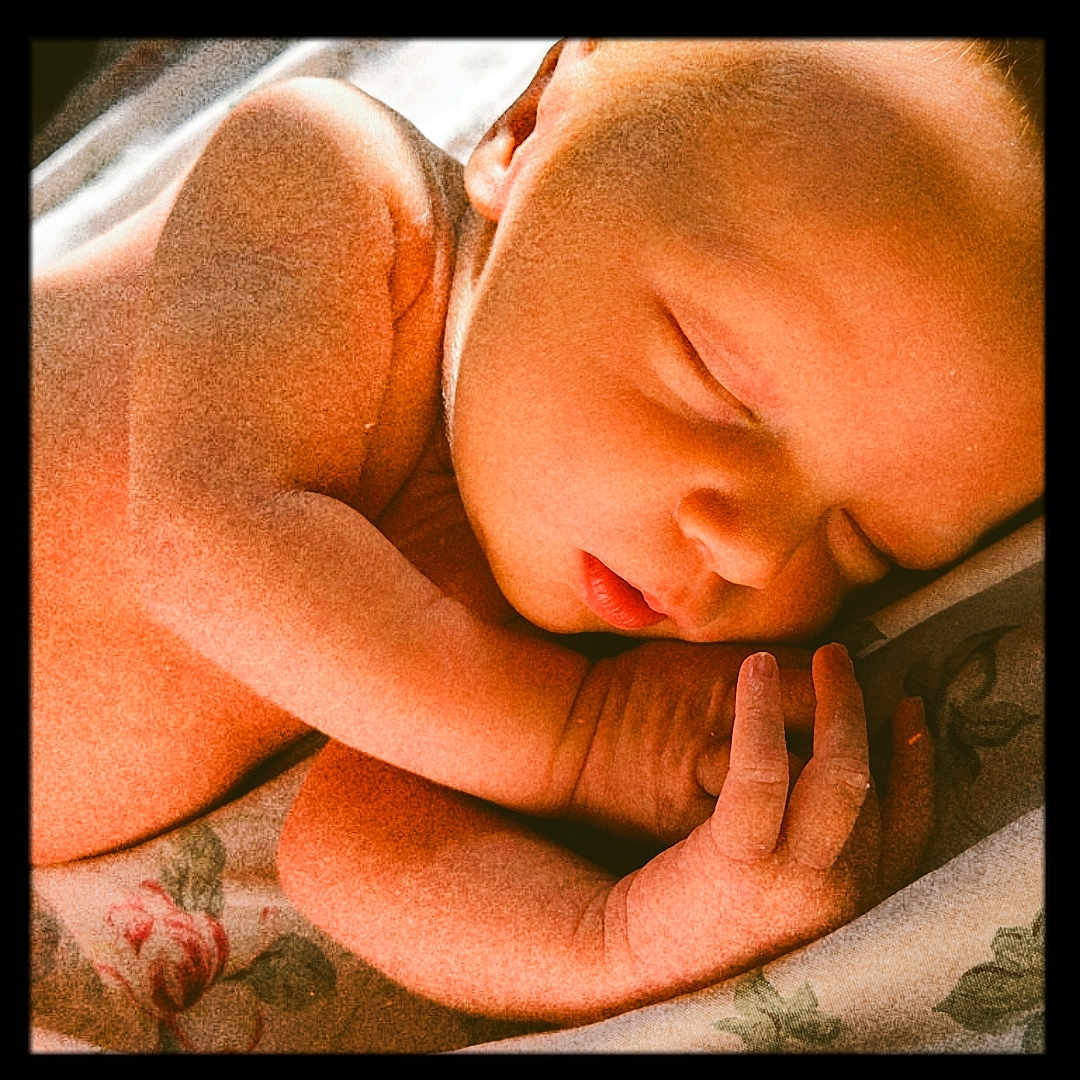 Milo joined the competition — help win amazing prizes! newborn, baby, sleeping, infant, peaceful, skin, face, hand, fingers, blanket, floral, resting, closeup, portrait, soft_light, delicate, cute, young, child, serene