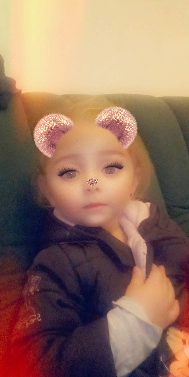 Talyana participe au concours pour gagner de l'argent avec cette photo : baby, cheek, child, doll, ear, eye, eyebrow, eyelash, face, forehead, hair_accessory, head, iris, lip, nose, person, pink, skin, smile, toddler