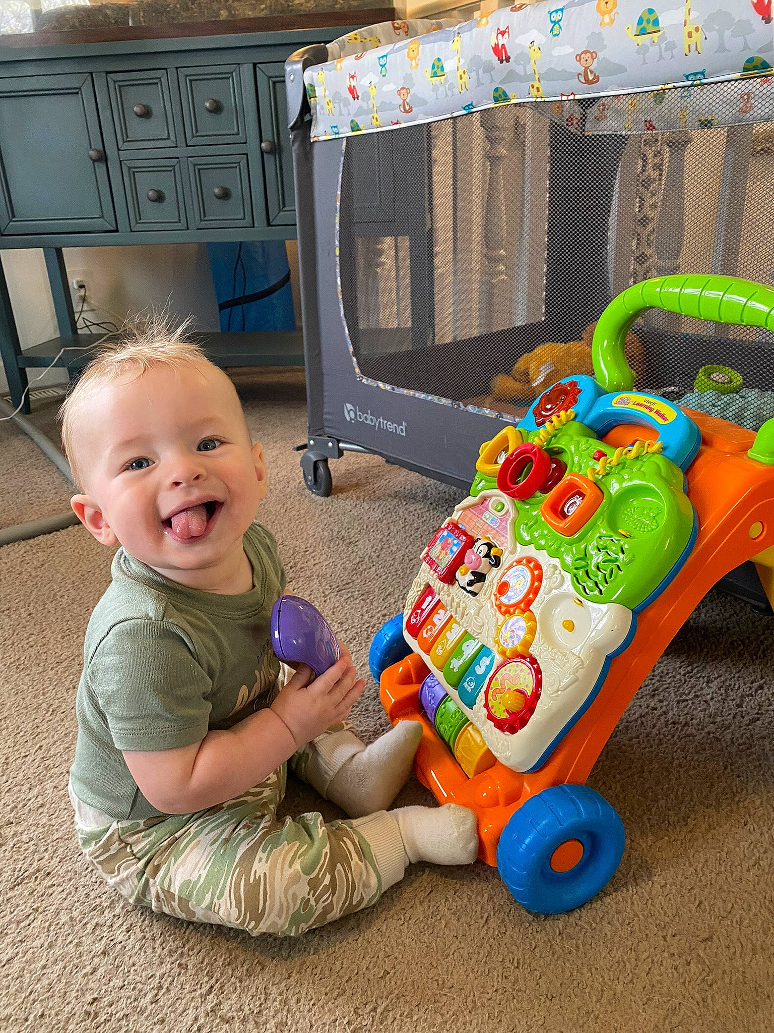 Owen is registered to the contest to win money with this photo: baby, baby_products, baby_toddler_clothing, baby_toys, chair, child, event, fun, happy, leisure, person, play, product, sitting, smile, tire, toddler, toy, vehicle, wheel