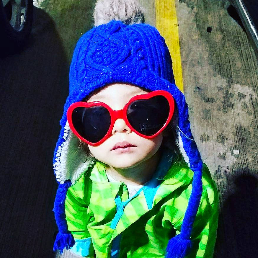 Raicheal is registered to the contest to win money with this photo: art, black_hair, blue, cap, cool, electric_blue, eyewear, fun, glasses, goggles, happy, human_body, knit_cap, person, plant, selfie, street_fashion, sunglasses, toddler, vision_care