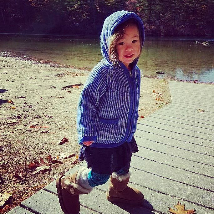 Raicheal joined the competition — help win amazing prizes! cloud, cool, eyewear, happy, human, leisure, morning, mountainous_landforms, outerwear, people_in_nature, person, shorts, sleeve, smile, standing, street_fashion, summer, sunlight, toddler, water