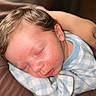 Adrian is registered to the contest to win money with this photo: baby, blanket, blue, checkered, closeup, clothing, face, hair, hand, indoor, infant, newborn, peaceful, portrait, resting, rosy_cheeks, skin, sleeping, soft, white
