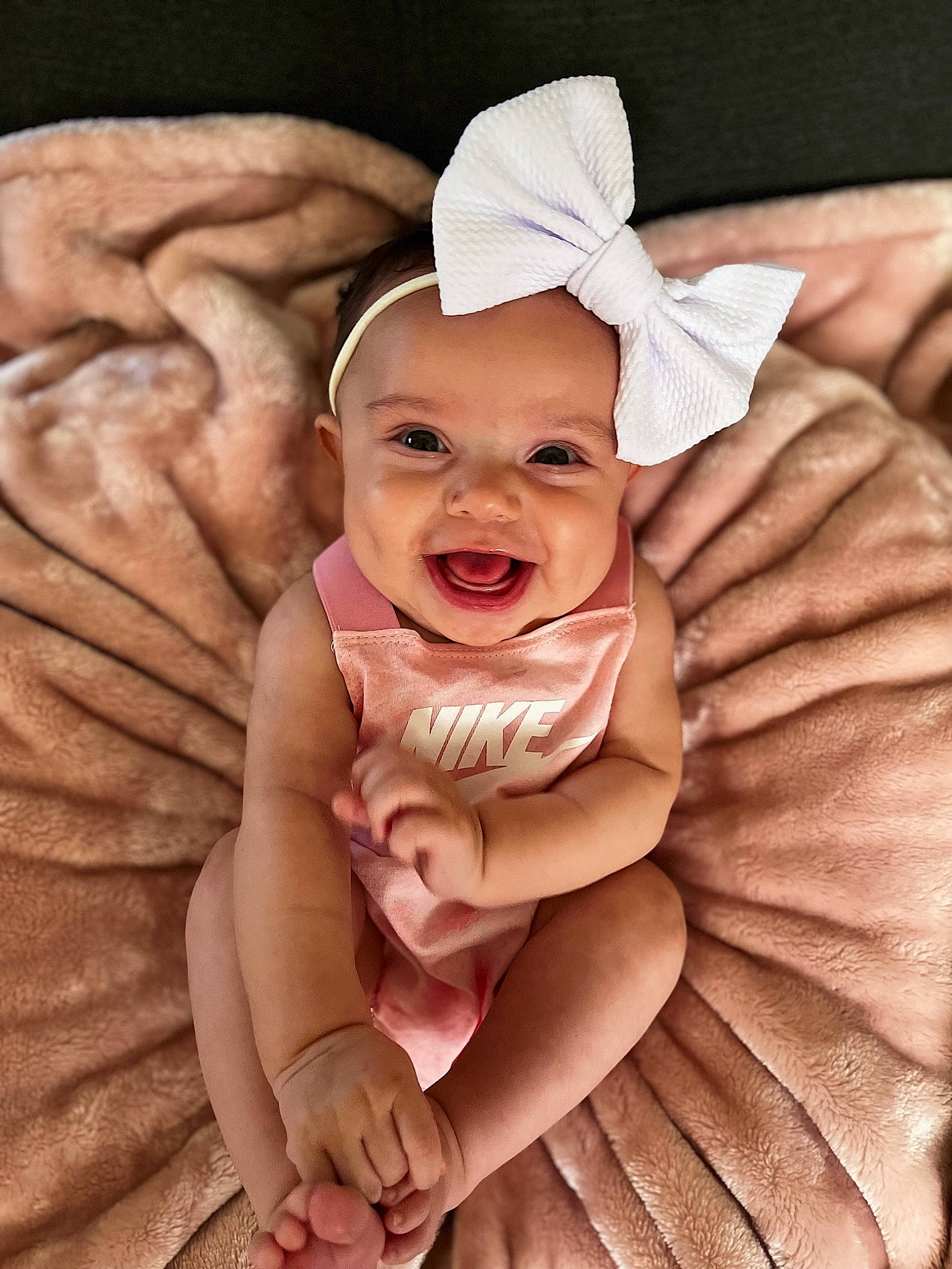 Journii is registered to the contest to win money with this photo: baby, baby_toddler_clothing, cheek, chin, eye, face, finger, flash_photography, fun, gesture, hand, happy, head, headgear, headwear, human_body, mouth, nose, person, smile