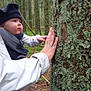 baby, child, forest, tree, moss, bark, nature, outdoor, person, hat, jacket, hand, adult, woods, exploration, green, plants, branches, trunk, curious