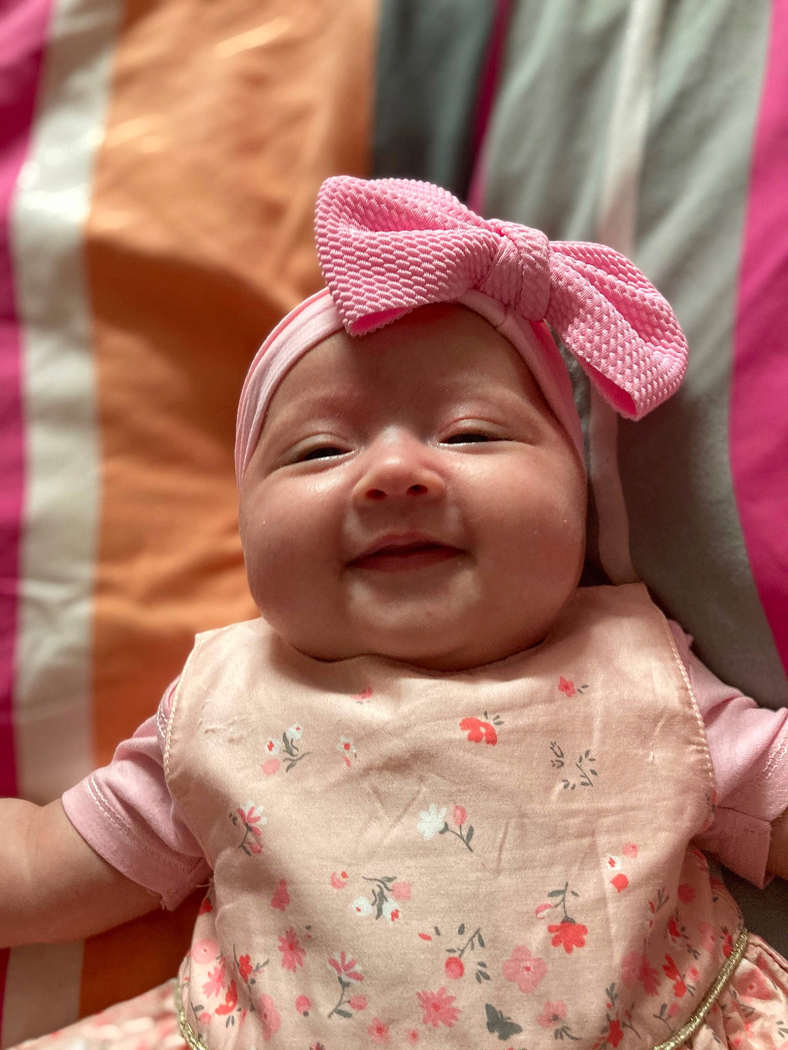 Tess participe au concours pour gagner de l'argent avec cette photo : baby, baby_toddler_clothing, cheek, chin, eye, face, gesture, happy, hat, headgear, headwear, lip, mouth, nose, person, photograph, pink, red, skin, sleeve