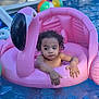 beach_ball, child, curly_hair, earrings, flamingo, floatie, inflatable, leisure, outdoor, pink, playful, pool, relaxing, summer, sunny, swimming_pool, toddler, vacation, water, water_toys