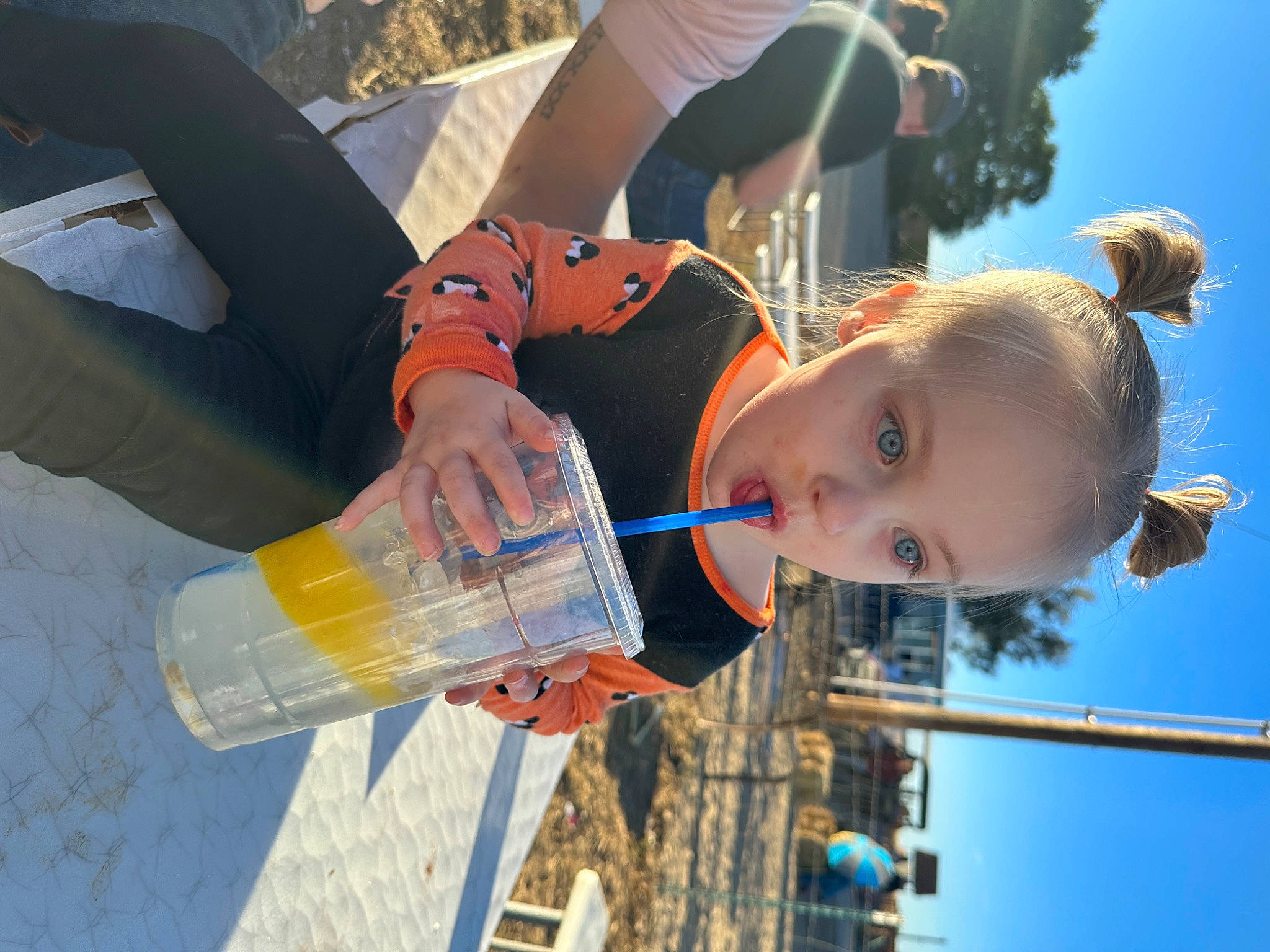 Parklynn is registered to the contest to win money with this photo: bottle, bottled_water, child, drink, drinking, drinking_water, drinkware, electric_blue, fluid, fun, happy, leisure, mineral_water, person, plastic_bottle, recreation, sky, toddler, water, water_bottle