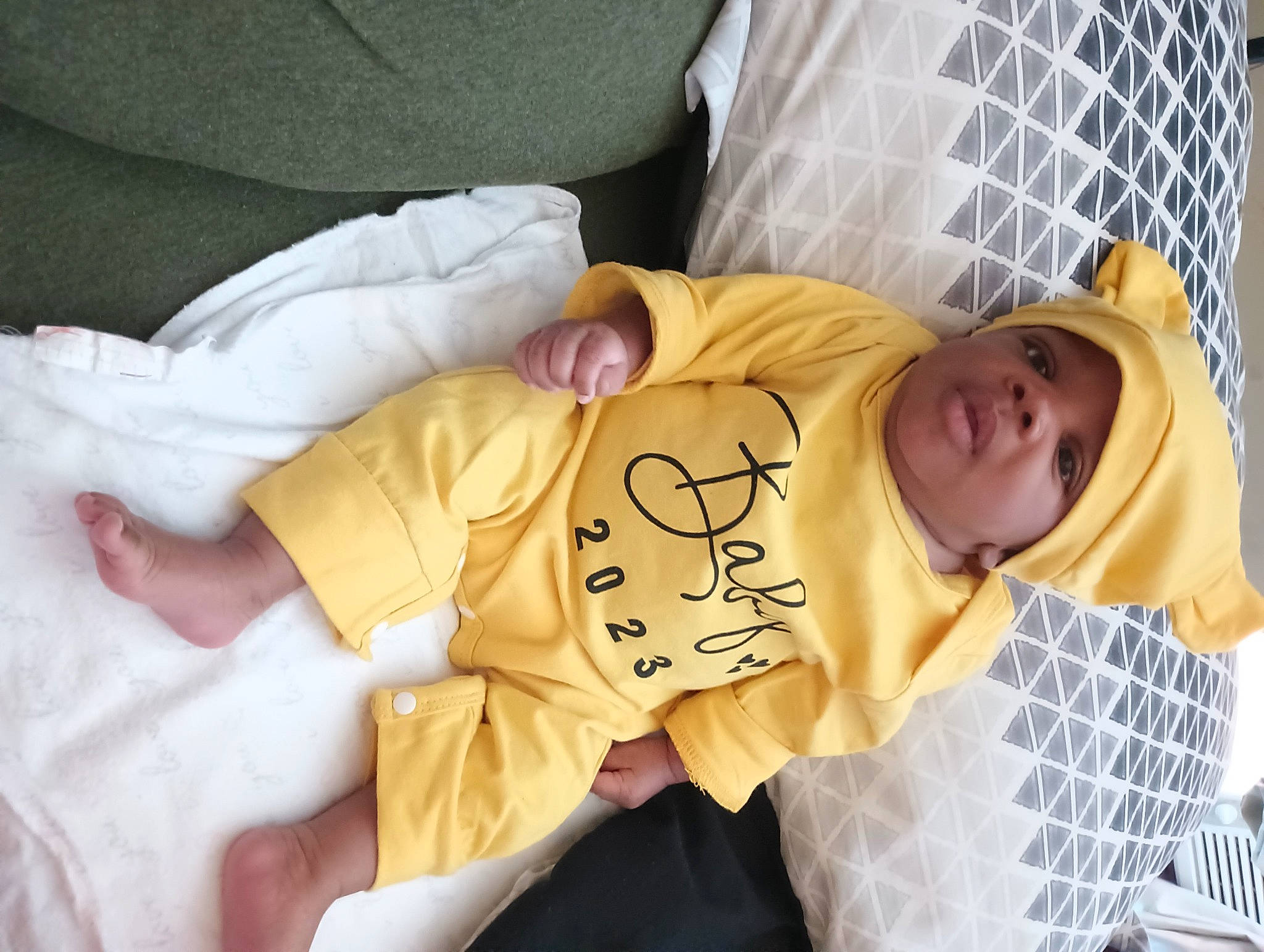 Amira is registered to the contest to win money with this photo: baby, baby_products, baby_safety, baby_sleeping, baby_toddler_clothing, bed, bedding, bedtime, child, comfort, hat, headwear, infant_bed, linens, nap, person, room, sleep, sleeve, t_shirt