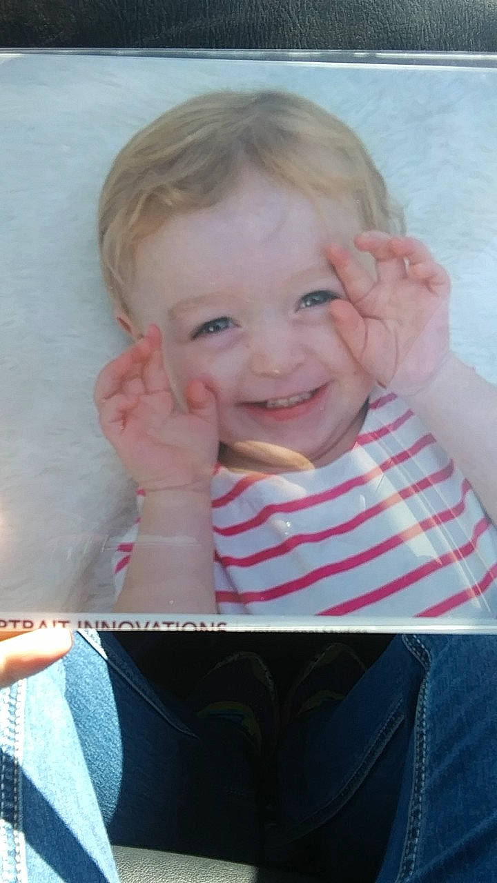 Jazmyn is registered to the contest to win money with this photo: baby, blond, cheek, child, ear, eye, face, facial_expression, finger, forehead, hand, head, joy, lip, mouth, neck, nose, person, pink, skin