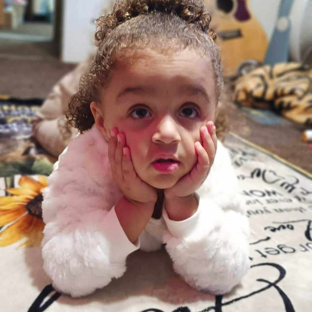 Arianna joined the competition — help win amazing prizes! baby, blonde, crawling, curlyhair, face, guitar, hair, handwriting, happy, head, musicalinstrument, person, photography, pingpong, pingpongpaddle, portrait, racket, sitting, sport, text