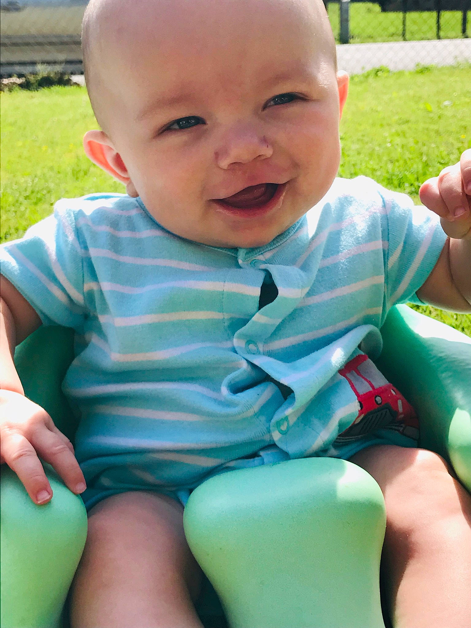 Ryder is registered to the contest to win money with this photo: baby, baby_toddler_clothing, child, grass, green, person, play, sitting, skin, smile, toddler