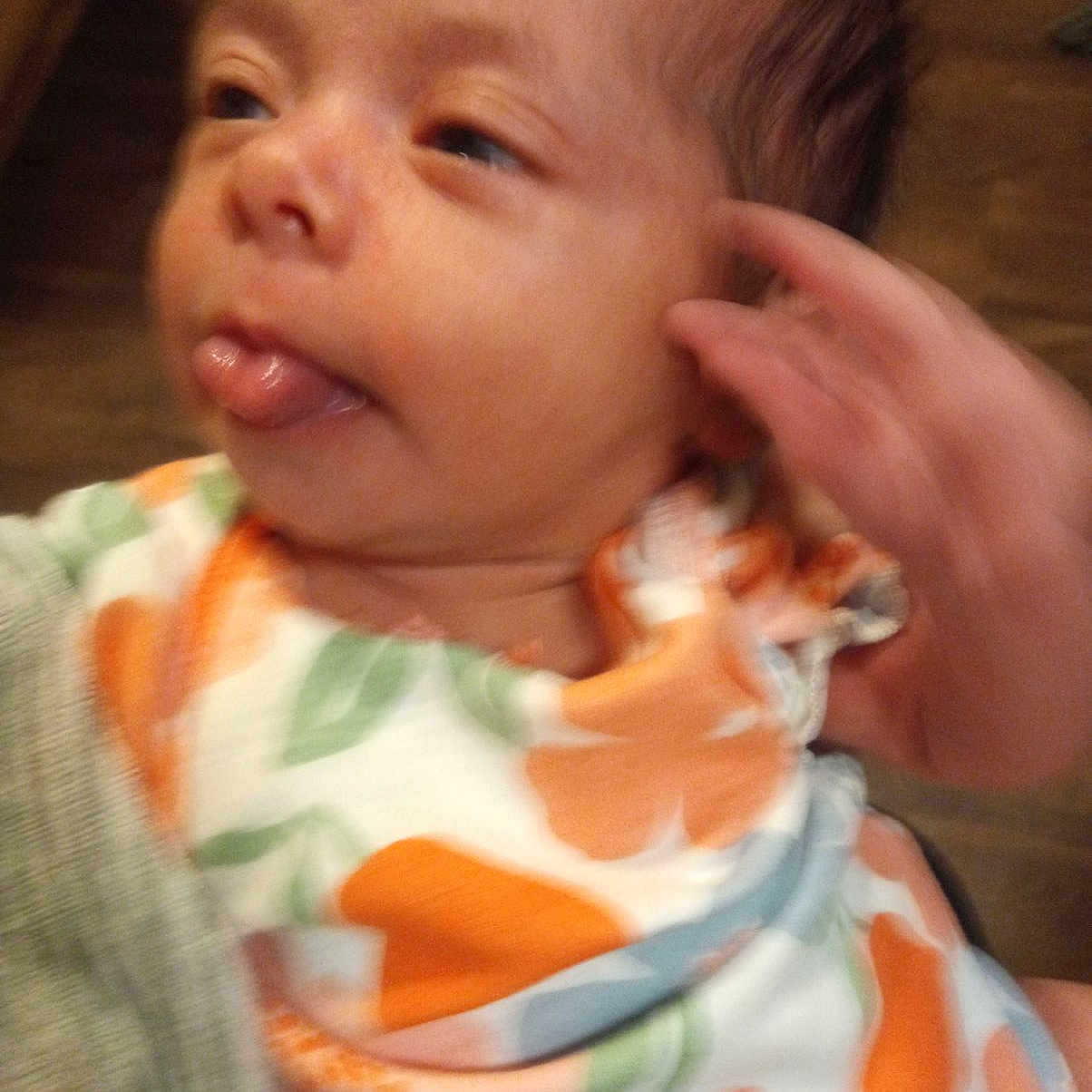 Rory is registered to the contest to win money with this photo: accessories, architecture, baby, bodypart, clothing, cutlery, dress, earring, face, finger, hand, head, jewelry, mouth, newborn, person, photography, portrait, sleeping, spoon