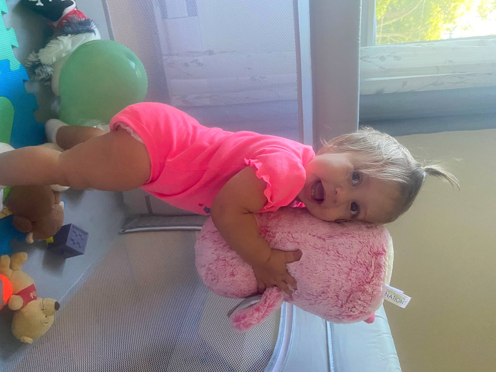 Marin joined the competition — help win amazing prizes! abdomen, baby, baby_products, baby_toddler_clothing, bed, child, comfort, diaper, fun, happy, human_leg, joint, knee, leisure, magenta, person, pink, shorts, thigh, toddler