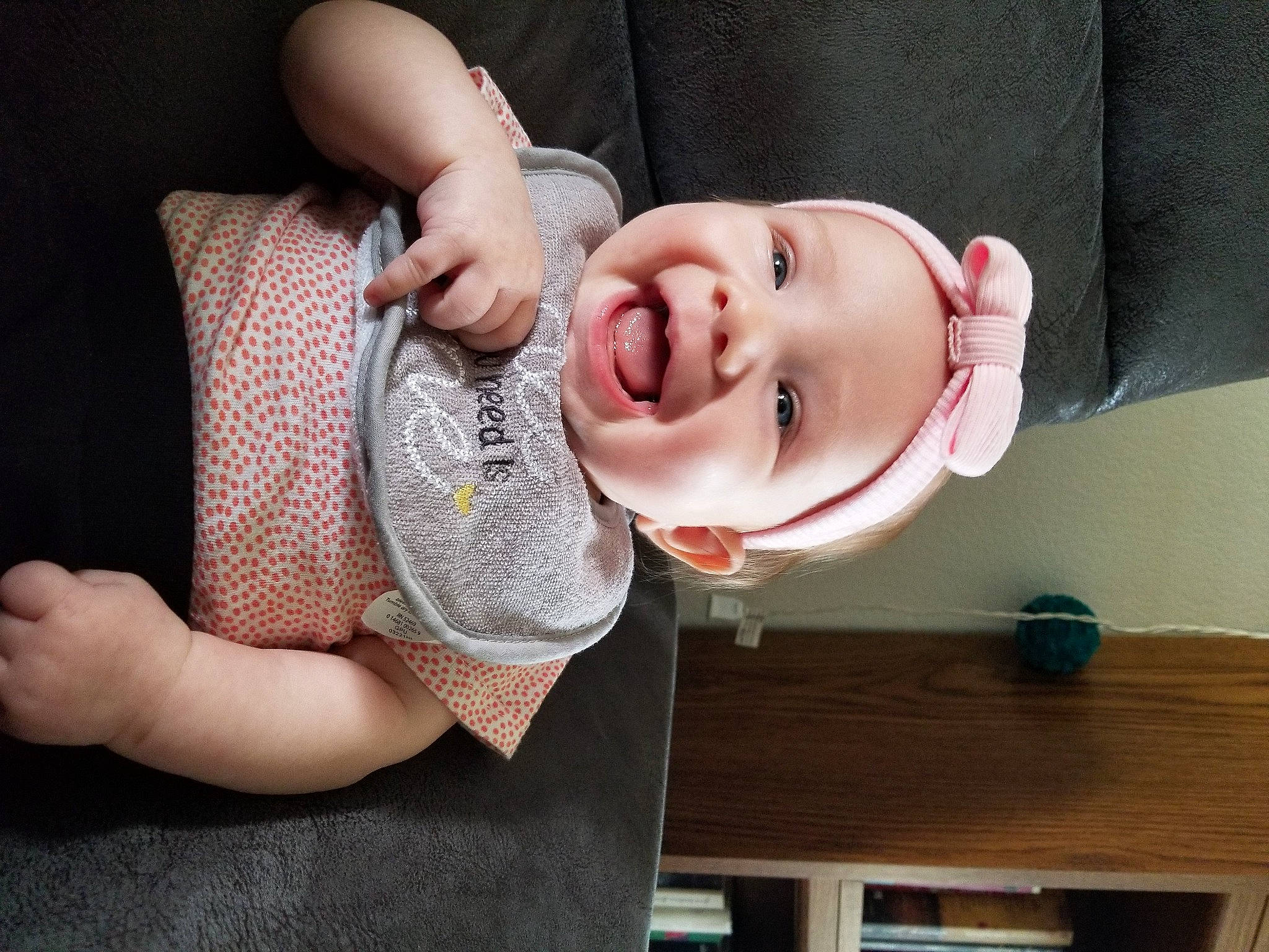 Runa is registered to the contest to win money with this photo: arm, baby_toddler_clothing, ear, eye, eyelash, gesture, hand, happy, hat, human_body, leg, lip, mouth, neck, nose, person, shoulder, skin, sleeve, smile