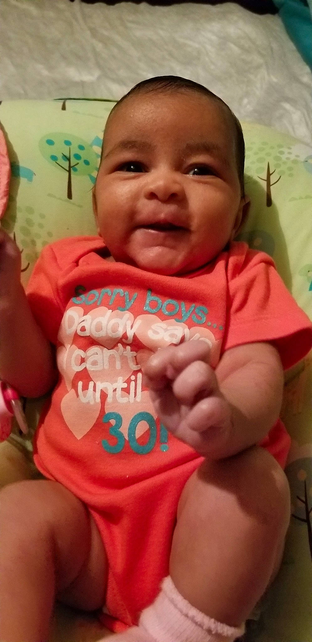 Davina is registered to the contest to win money with this photo: abdomen, cheek, child, day, face, finger, fun, girl, hand, head, infant, iris, lip, mouth, person, pink, product, skin, smile, toddler