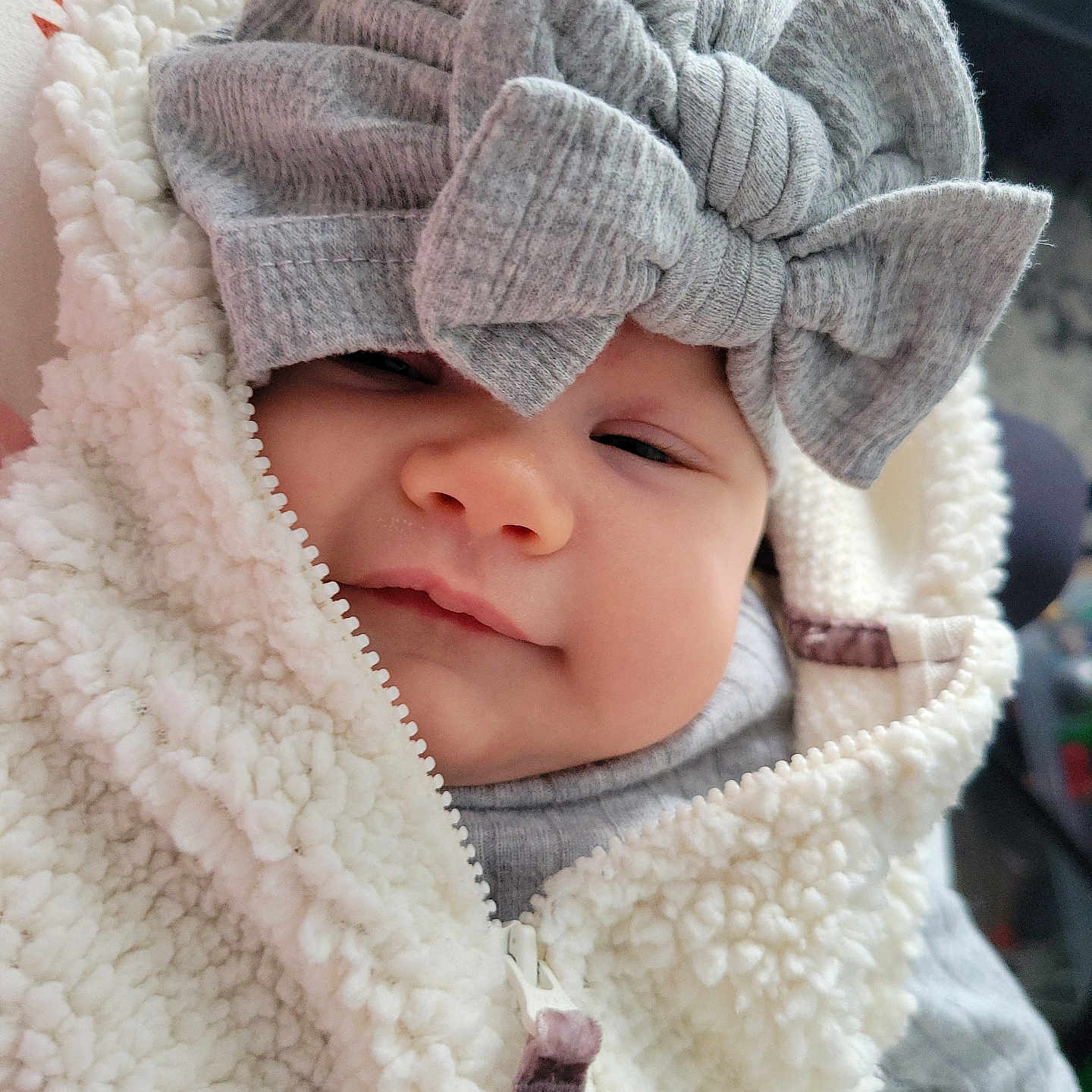 Aviendha joined the competition — help win amazing prizes! adorable, apparel, baby, bow, child, closeup, clothing, cute, face, fleece, headband, indoor, infant, jacket, person, portrait, sleeper, smile, soft, warm