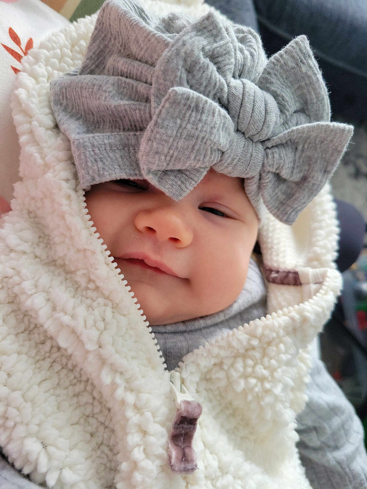 Aviendha joined the competition — help win amazing prizes! adorable, apparel, baby, bow, child, closeup, clothing, cute, face, fleece, headband, indoor, infant, jacket, person, portrait, sleeper, smile, soft, warm