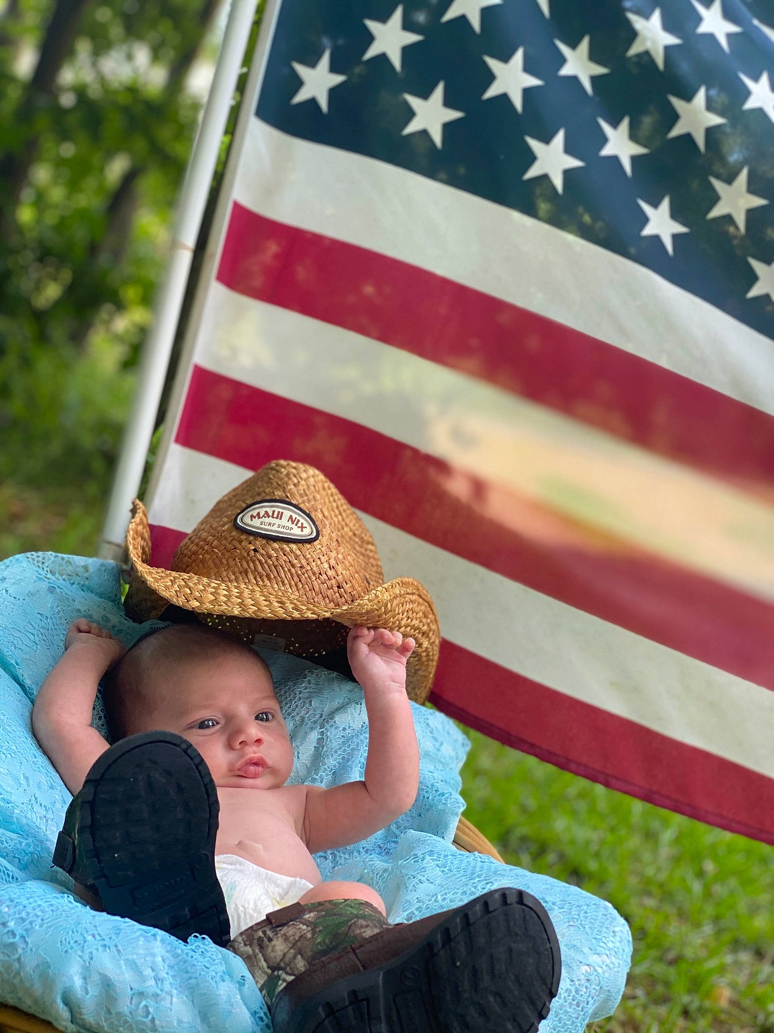 Mason is registered to the contest to win money with this photo: child, flag, flag_day_usa, flag_of_the_united_states, grass, hat, headgear, holiday, independence_day, memorial_day, person, summer, sun_hat, toddler, tree, vacation