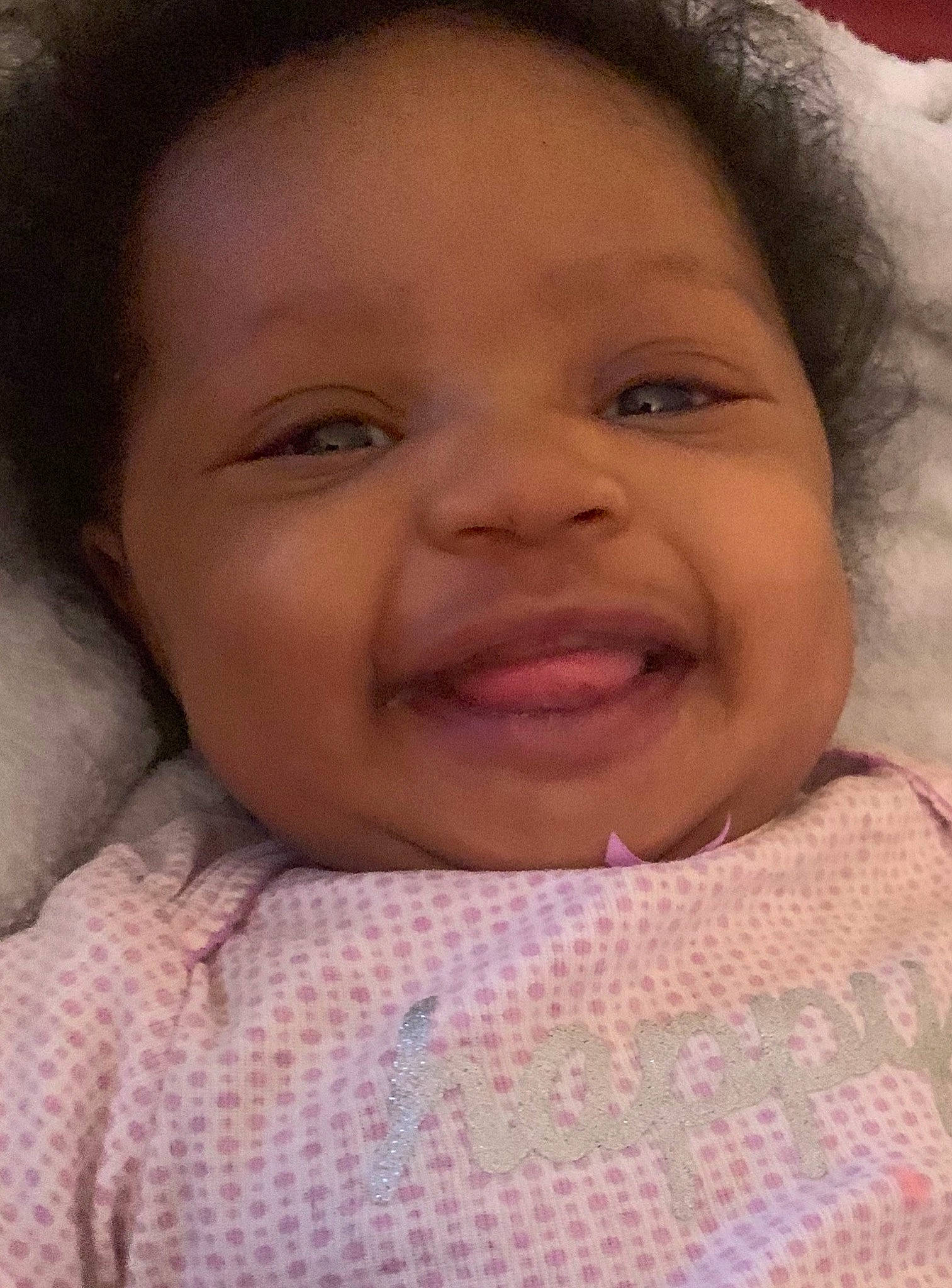 Ashlyn is registered to the contest to win money with this photo: baby, baby_toddler_clothing, cheek, child, chin, eyebrow, eyelash, facial_expression, forehead, happy, iris, jaw, joy, lip, mouth, nose, person, pink, skin, smile