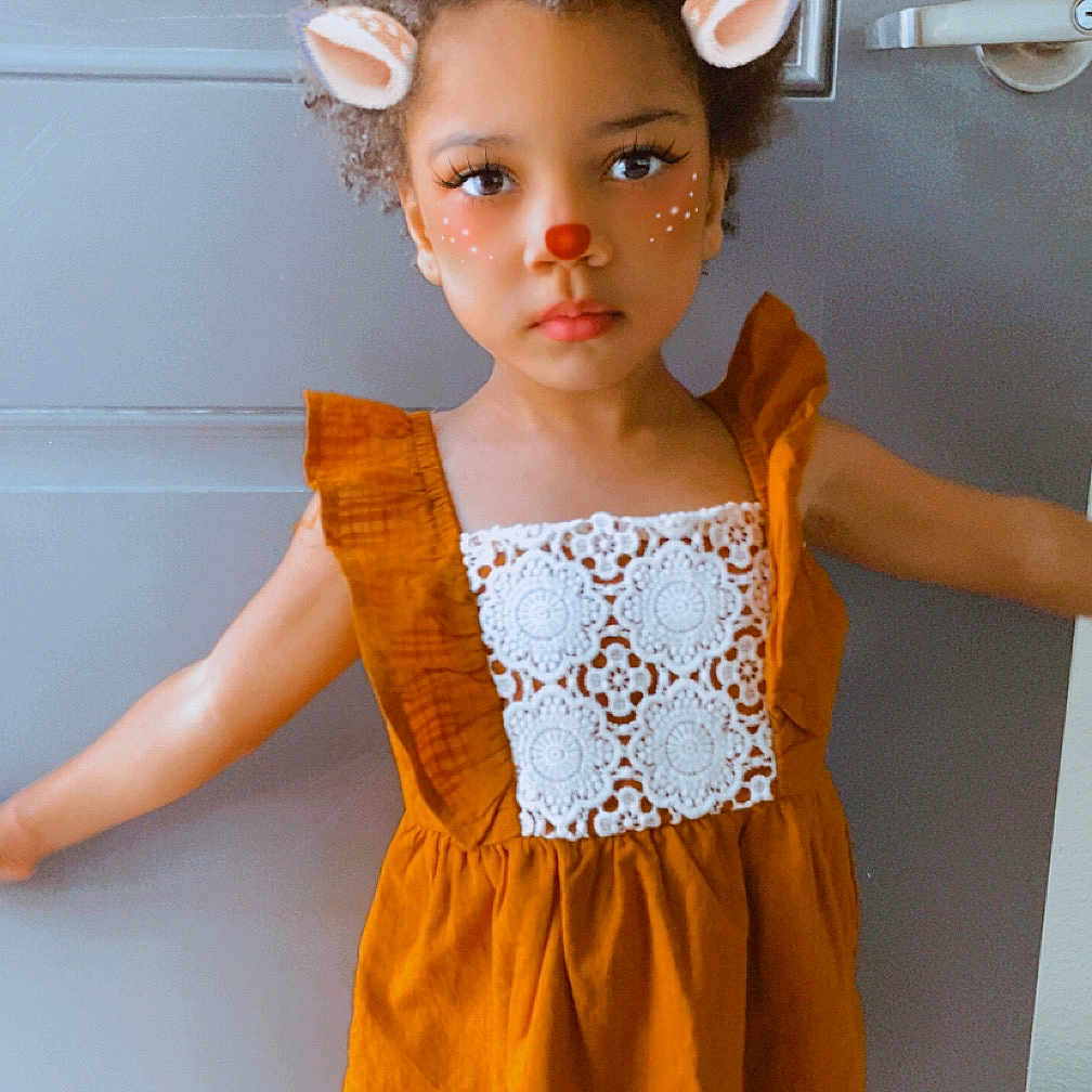 Nene joined the competition — help win amazing prizes! antlers, child, curly_hair, cute, door, dress, ears, face_filter, freckles, girl, holiday_theme, indoors, lace, orange_dress, person, playful, portrait, red_nose, reindeer_filter, standing