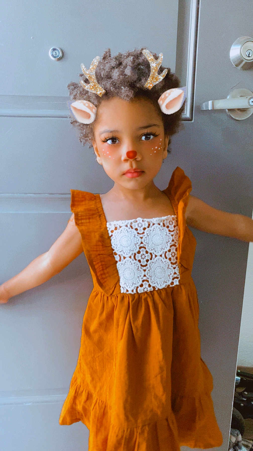 Nene joined the competition — help win amazing prizes! child, girl, dress, orange_dress, lace, door, indoors, face_filter, reindeer_filter, antlers, ears, red_nose, freckles, curly_hair, standing, portrait, person, cute, holiday_theme, playful