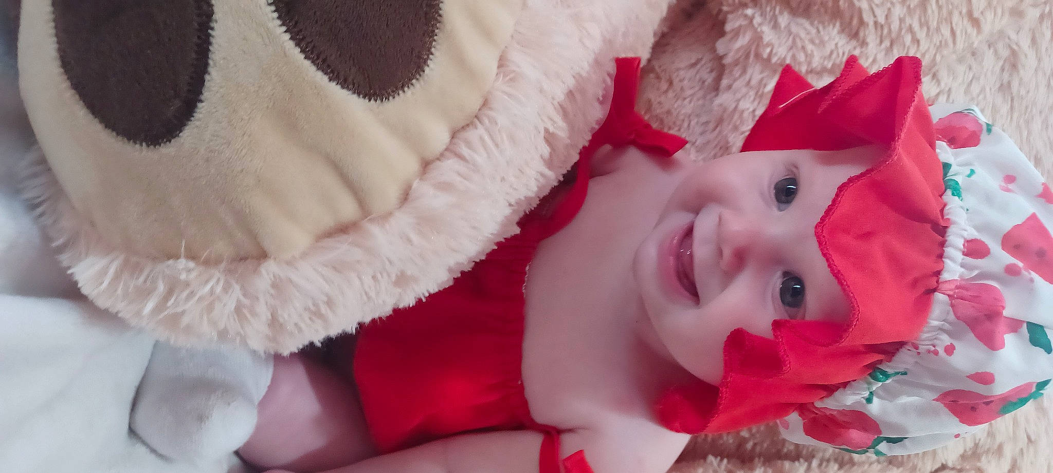 Harper is registered to the contest to win money with this photo: cap, carmine, child, close_up, eye, eyelash, fashion_accessory, fur, happy, headgear, headwear, lip, magenta, mammal, person, petal, pink, red, smile, textile