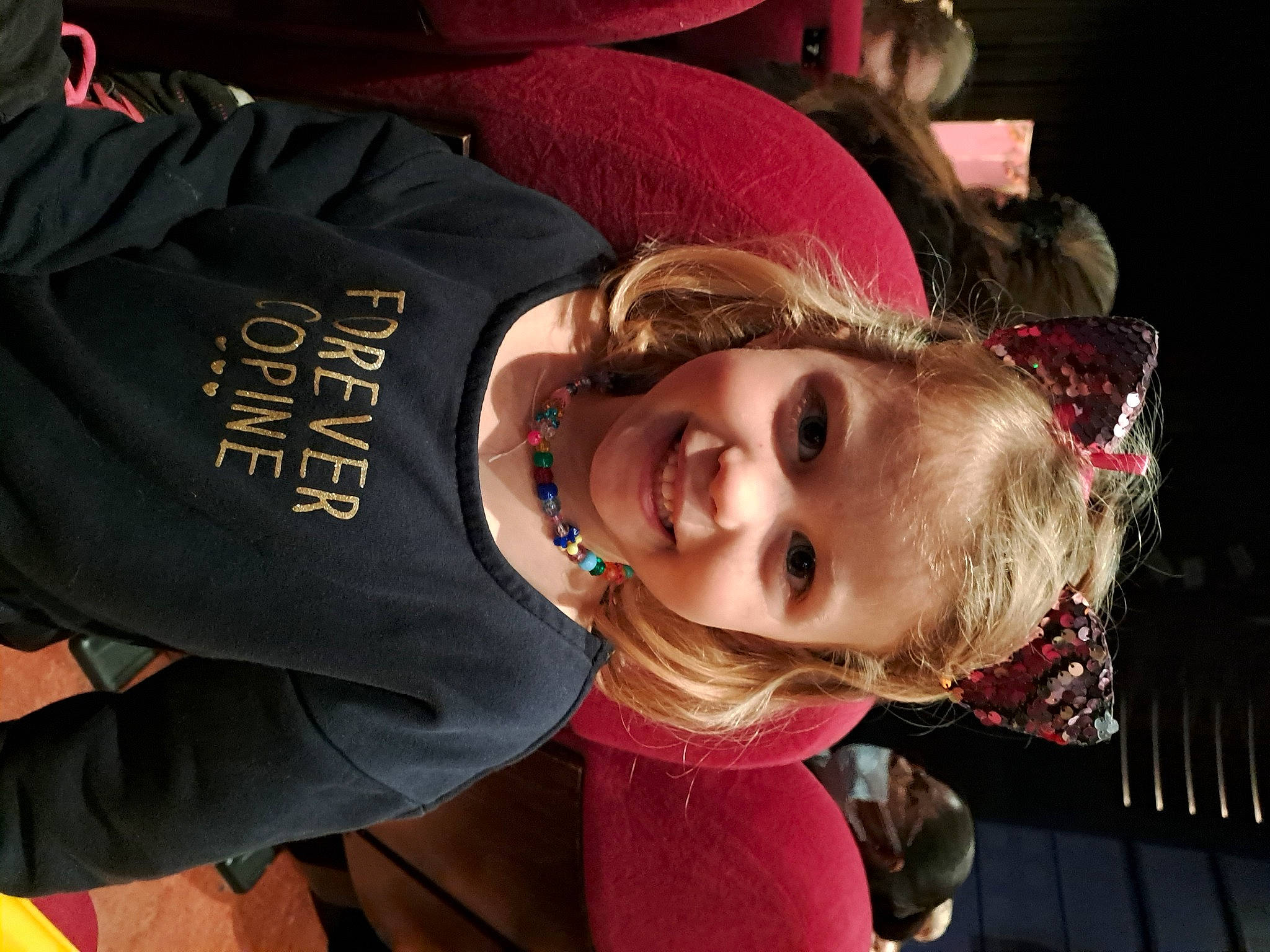 Nelia a rejoint le concours — aidez-le/la à gagner de superbes lots ! cheek, child, event, eyelash, eyewear, fashion_accessory, flash_photography, flesh, fun, happy, headgear, joy, magenta, person, portrait_photography, smile, toddler, tradition