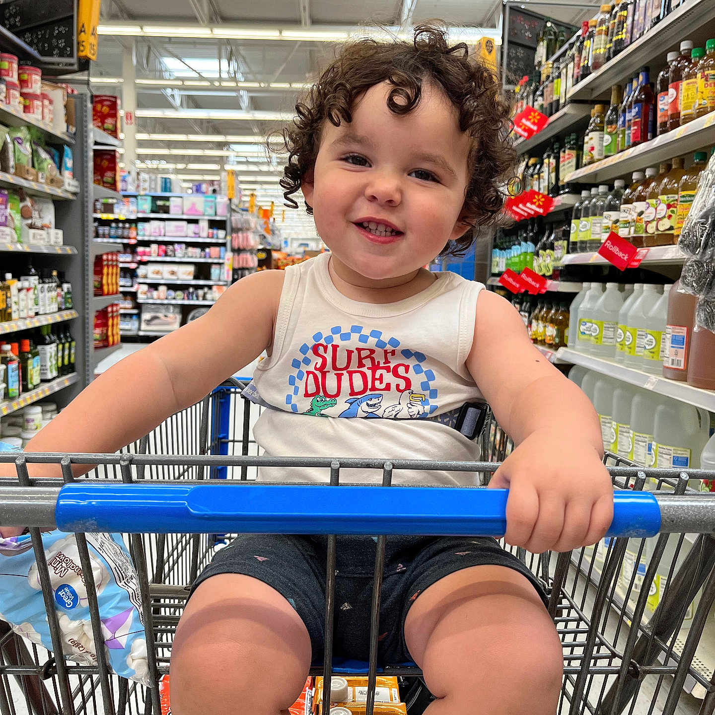 Liam Armani joined the competition — help win amazing prizes! aisle, baby, basket, clothing, face, food, grocerystore, head, indoors, market, person, photography, portrait, shelf, shop, shopping, shoppingcart, shorts, supermarket, tape