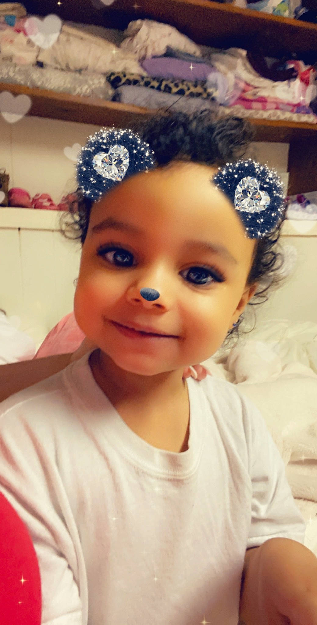 Scarlett is registered to the contest to win money with this photo: cheek, child, crown, eyebrow, face, fashion_accessory, forehead, hair, hair_accessory, hairstyle, head, headband, headgear, headpiece, joy, lip, nose, person, skin, smile