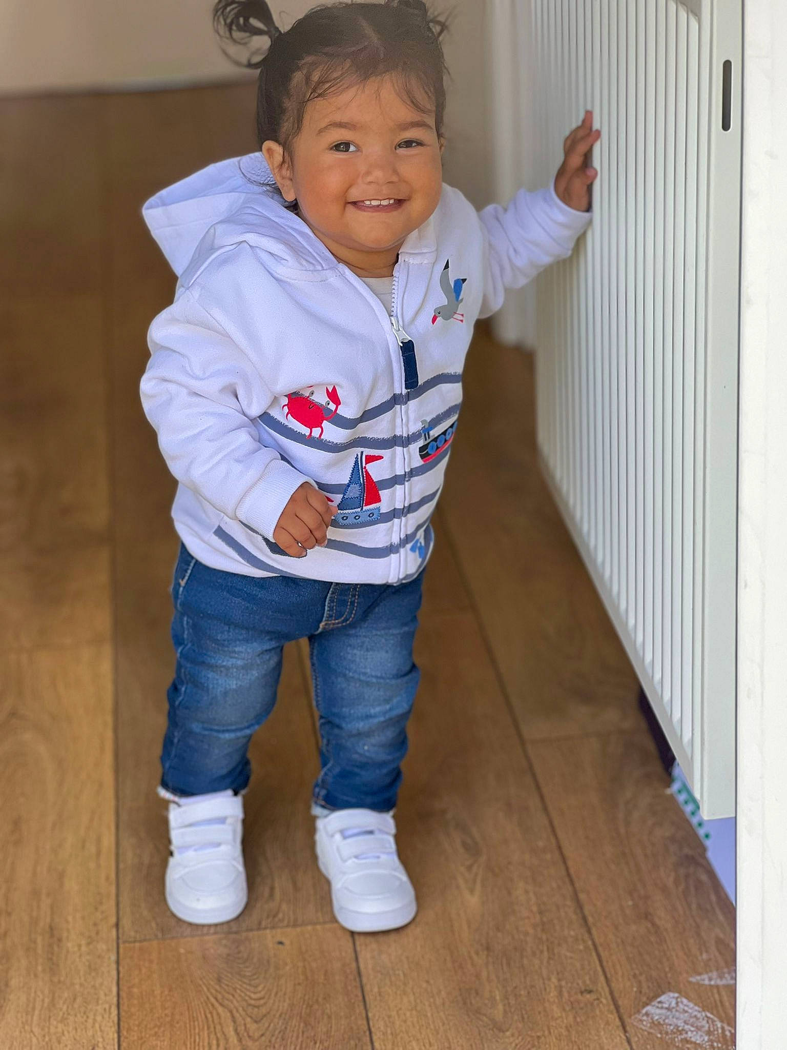 Samreet joined the competition — help win amazing prizes! baby_toddler_clothing, cheek, chin, denim, electric_blue, floor, flooring, fun, gesture, hair, happy, hardwood, human_body, joy, leg, nose, person, sleeve, smile, thumb