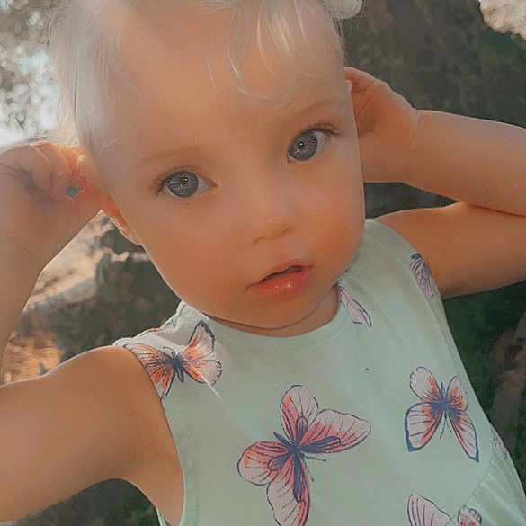 Hope joined the competition — help win amazing prizes! chin, dress, eye, eyebrow, eyelash, facial_expression, finger, gesture, grass, happy, iris, leaf, lip, mammal, people_in_nature, pink, skin, textile, vertebrate, white