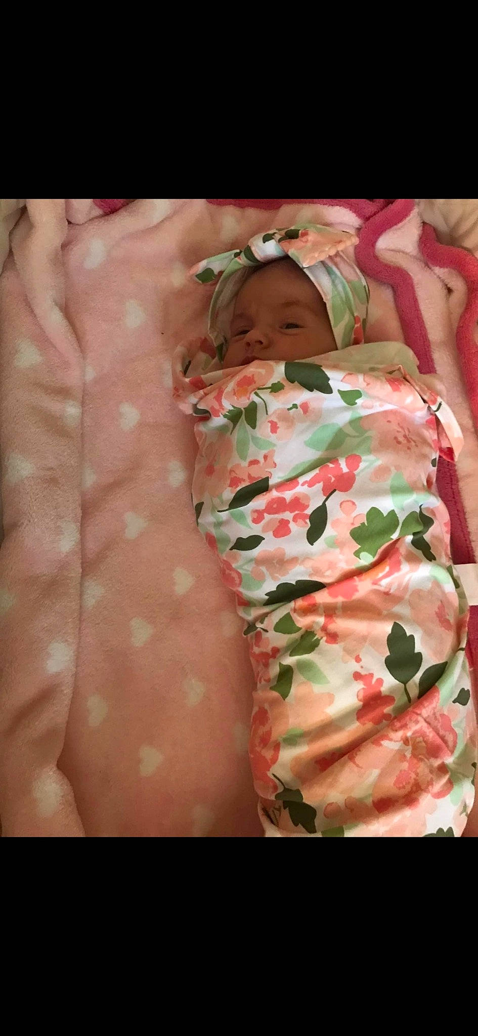 Alexis joined the competition — help win amazing prizes! baby, baby_products, baby_sleeping, baby_toddler_clothing, bedding, comfort, eye, face, finger, head, human_body, linens, pattern, person, pink, skin, sleeve, textile, thigh, thumb