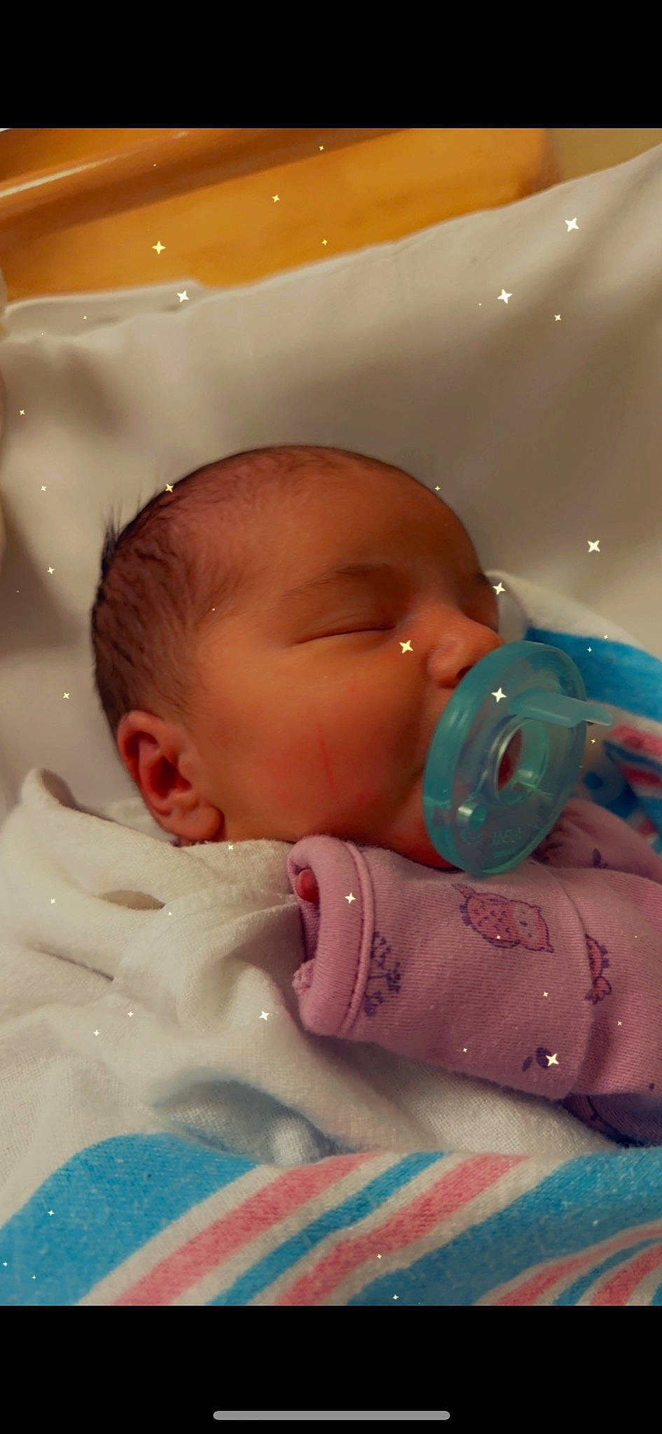 Alexis is registered to the contest to win money with this photo: baby, baby_products, baby_sleeping, baby_toddler_clothing, bedtime, cheek, child, comfort, drinkware, eyelash, fluid, human_body, linens, lip, mouth, nose, person, product, room, skin