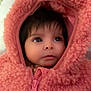 baby, child, face, pink, jacket, hood, fur, zipper, cute, eyes, portrait, young, warm, cozy, indoor, infant, clothing, person, headwear, soft