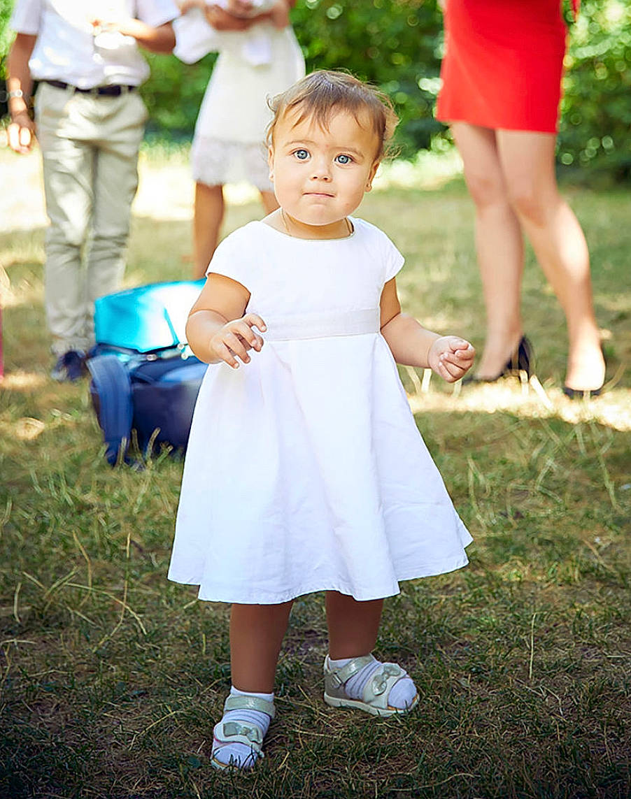 Nicoleta participe au concours pour gagner de l'argent avec cette photo : ceremony, child, dress, event, family, flower, grass, happy, people, person, photograph, photography, pink, plant, smile, snapshot, summer, toddler, walking, wedding