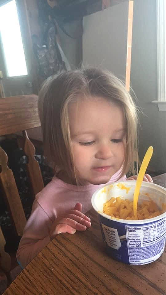 Everleigh is registered to the contest to win money with this photo: breakfast, chair, child, comfort_food, cuisine, dish, eating, fast_food, food, food_craving, ingredient, junk_food, person, sharing, spoon, sweetness, table, tableware, television, toddler