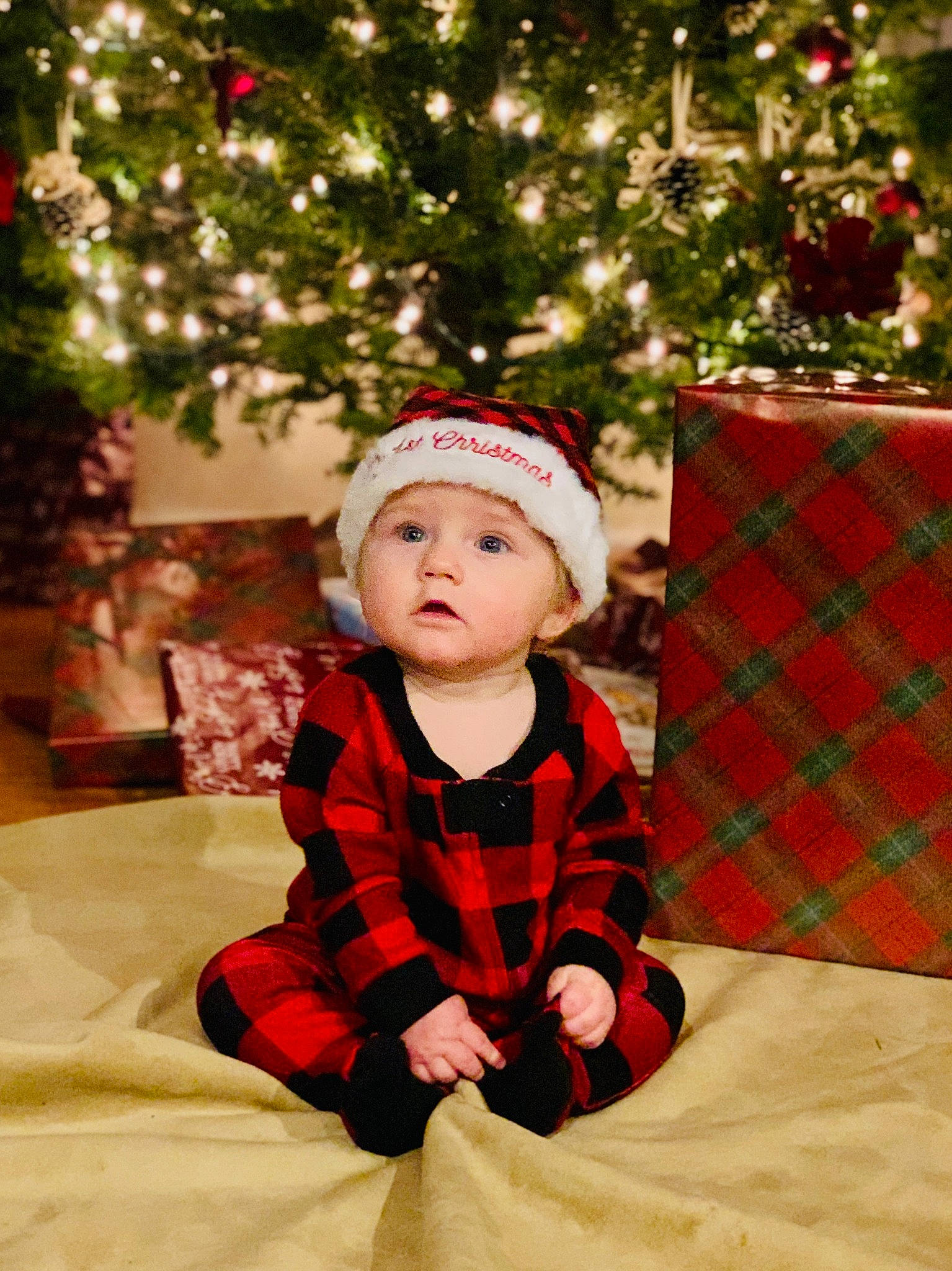 Jonathan is registered to the contest to win money with this photo: baby, baby_toddler_clothing, christmas, christmas_decoration, christmas_eve, christmas_ornament, christmas_tree, event, fun, happy, headwear, holiday, ornament, pattern, person, plaid, plant, sleeve, tartan, toddler