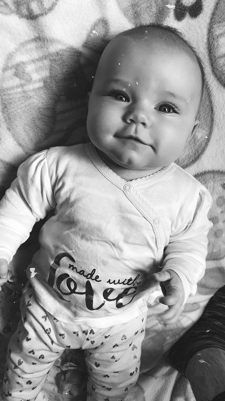 Emelia is registered to the contest to win money with this photo: baby, black, black_and_white, cheek, child, eye, face, facial_expression, forehead, head, lip, monochrome, monochrome_photography, nose, people, person, photograph, skin, smile, toddler