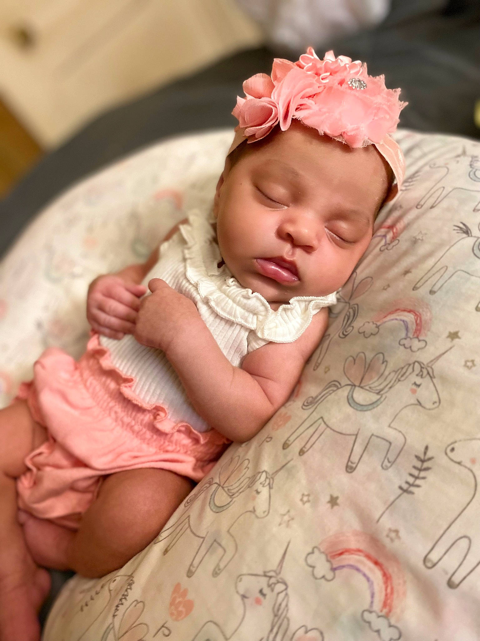 Kalianna is registered to the contest to win money with this photo: arm, baby, baby_toddler_clothing, cheek, child, chin, comfort, eye, face, facial_expression, finger, hand, headband, headgear, headpiece, headwear, lip, person, pink, skin