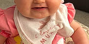 Emily Rose joined the competition — help win amazing prizes! architecture, baby, babylaughing, building, clothing, couch, cushion, face, furniture, happy, head, homedecor, indoors, laughing, person, photography, portrait, sitting, smile, t_shirt